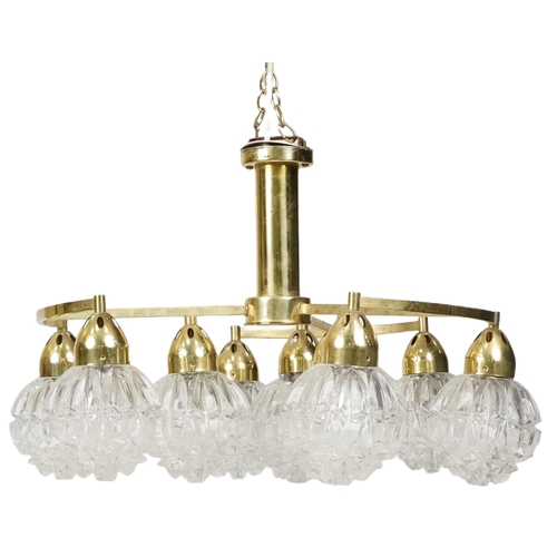 753 - Vintage brass chandelier with nine globular glass shades, 55cm in diameter