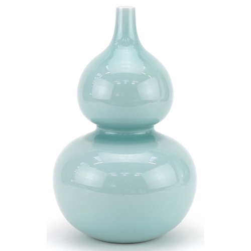 276 - Chinese celadon glazed porcelain onion shaped vase, blue character mark to the base, 28cm high