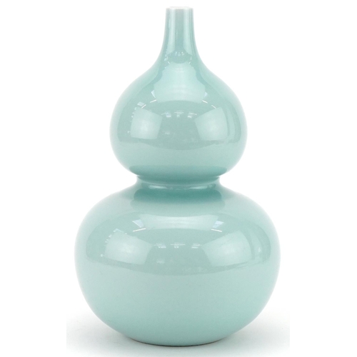 276 - Chinese celadon glazed porcelain onion shaped vase, blue character mark to the base, 28cm high