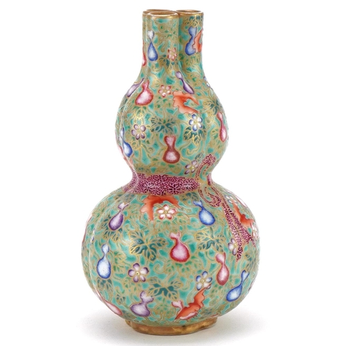 148 - Chinese porcelain vase finely hand painted with flowers and objects, character mark to base, 16cm hi... 