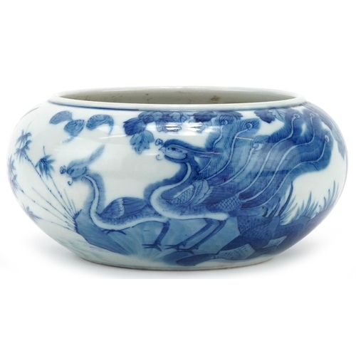 299 - Chinese porcelain blue and white bowl decorated with birds in a landscape, character mark to the bas... 