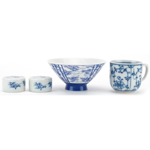 300 - Oriental porcelain blue and white rice bowl, ginger jar covers and a cup, the largest 12cm in diamet... 