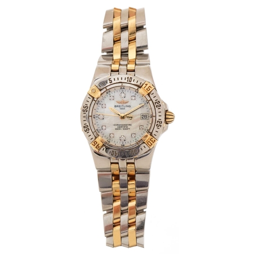 3023 - Breitling, ladies two tone Breitling chronometer wristwatch having diamond set mother of pearl dial ... 