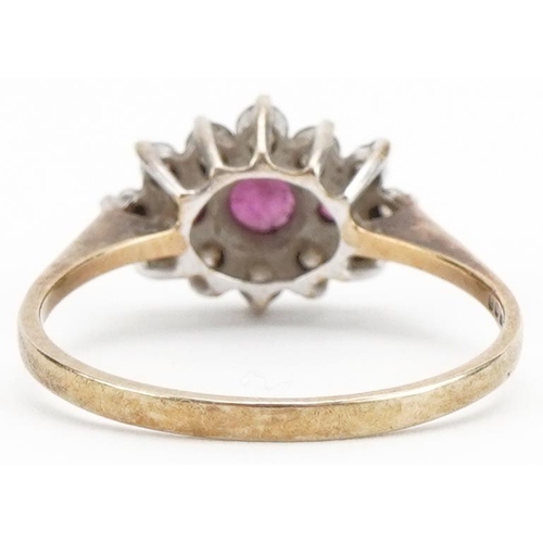 3374 - 9ct gold pink spinel and clear stone cluster ring, size O, 1.8g