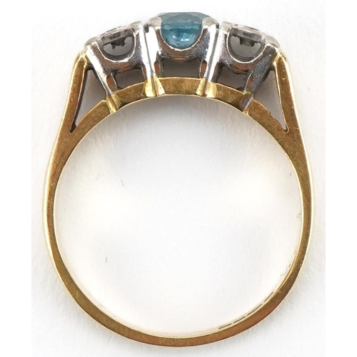 3222 - 18ct gold aquamarine and diamond three stone ring, size K, 4.0g