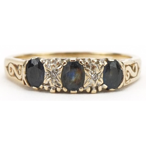 3329 - 9ct gold diamond and blue spinel five stone ring, size M/N, 2.3g