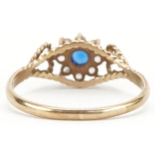 3033 - 9ct gold blue and clear stone flower head ring with love heart shoulders, size Q, 1.6g