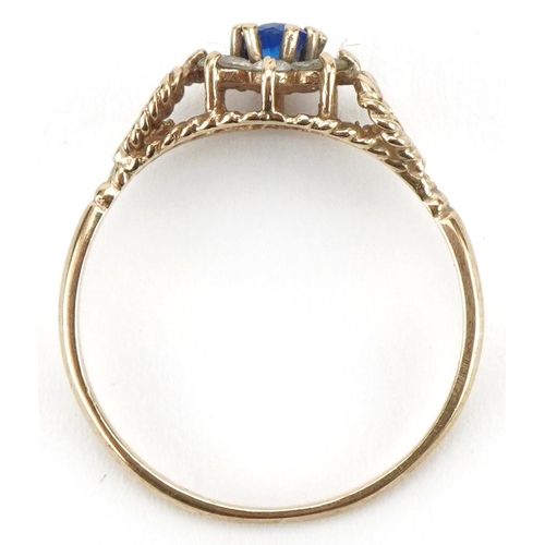 3033 - 9ct gold blue and clear stone flower head ring with love heart shoulders, size Q, 1.6g