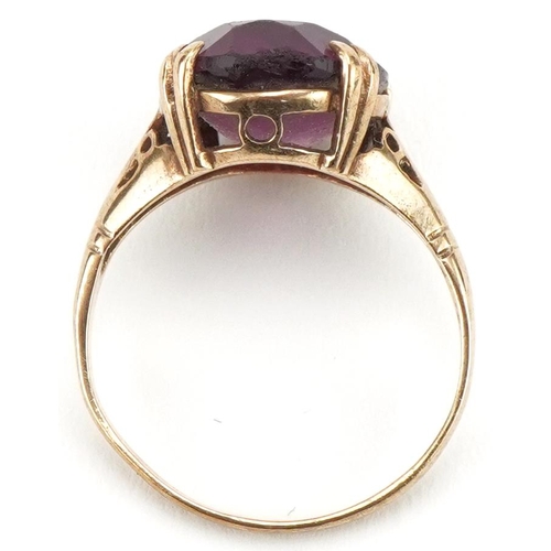 3378 - 9ct gold purple stone solitaire ring, size J, 2.6g