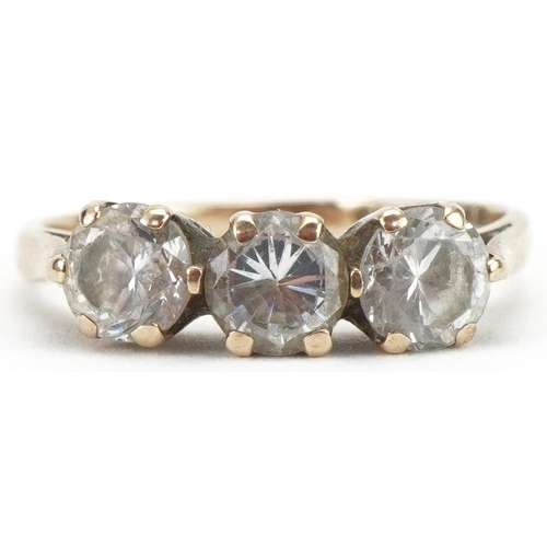 3267 - 9ct gold clear stone trilogy ring, size L, 2.1g