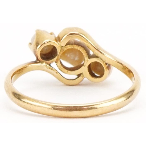 3075 - Unmarked gold pearl crossover ring, size L, 3.1g