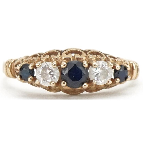 3068 - 9ct gold sapphire and clear stone ring with ornate setting set with five stones, size I, 1.4g