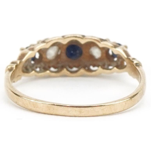 3068 - 9ct gold sapphire and clear stone ring with ornate setting set with five stones, size I, 1.4g