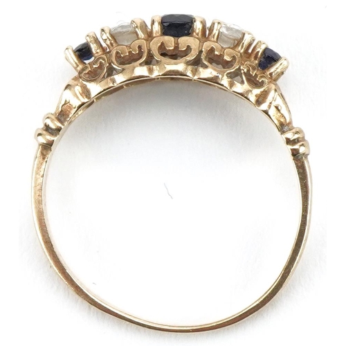 3068 - 9ct gold sapphire and clear stone ring with ornate setting set with five stones, size I, 1.4g