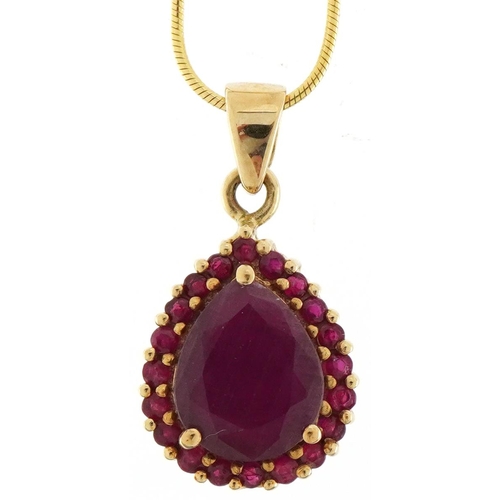 3089 - 9ct gold ruby teardrop pendant on a 9ct gold necklace, 2.2cm high and 50cm in length, total 4.4g