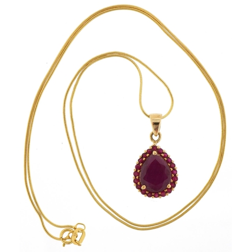 3089 - 9ct gold ruby teardrop pendant on a 9ct gold necklace, 2.2cm high and 50cm in length, total 4.4g