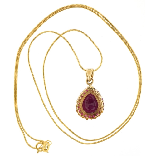 3089 - 9ct gold ruby teardrop pendant on a 9ct gold necklace, 2.2cm high and 50cm in length, total 4.4g