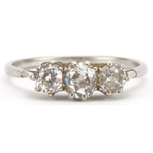 3008 - Unmarked white gold diamond three stone ring, total diamond weight approximately 0.80 carat, size N,... 