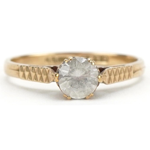 3127 - 9ct gold clear stone solitaire ring with engine turned shoulders, size M, 1.5g