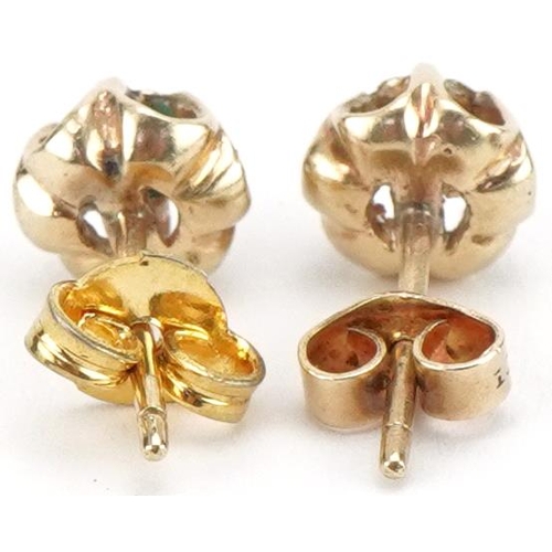 3197 - Pair of unmarked gold diamond solitaire stud earrings, 7mm in diameter, total 1.6g