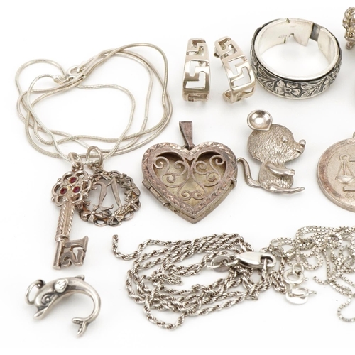 3451 - Vintage and later silver and white metal jewellery including charms, pendants and necklaces, total 8... 