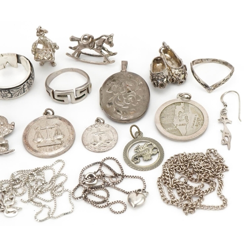 3451 - Vintage and later silver and white metal jewellery including charms, pendants and necklaces, total 8... 