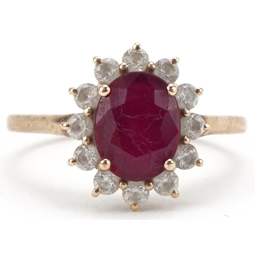 3123 - 9ct gold red and clear stone cluster ring, size Q, 2.7g