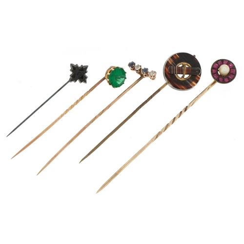 3170 - Five antique gold and yellow metal stickpins housed in three boxes including Scottish agate, diamond... 