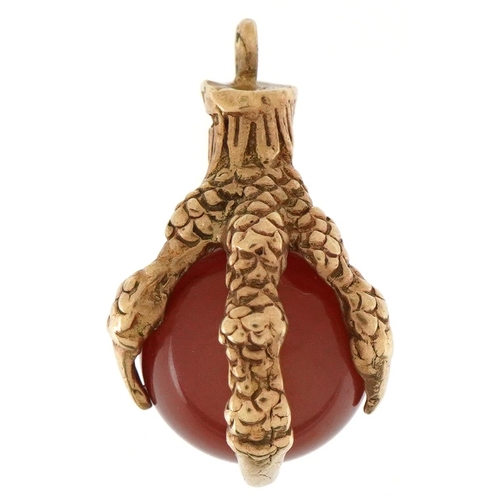 3092 - 9ct gold agate charm in the form of a dragon claw and ball, 2.4cm high, 5.3g