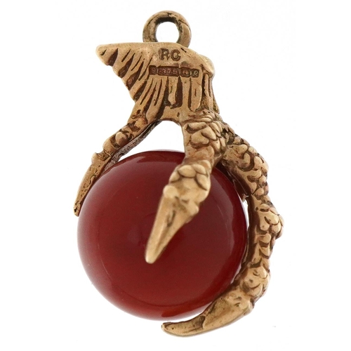 3092 - 9ct gold agate charm in the form of a dragon claw and ball, 2.4cm high, 5.3g