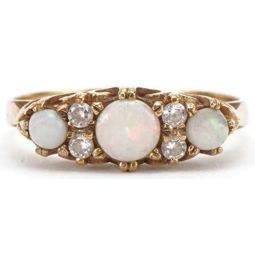 3381 - 9ct gold opal and clear stone ring set with seven stones, size P/Q, 2.0g