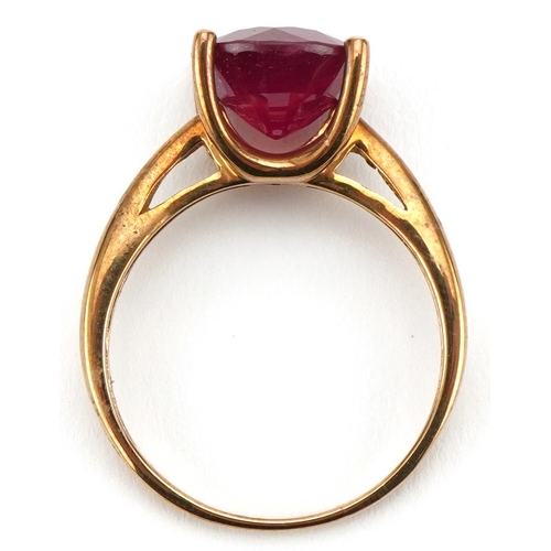 3125 - 9ct gold ruby solitaire ring, the ruby approximately 10.10mm in diameter x 6.50mm deep, size S, 4.0g