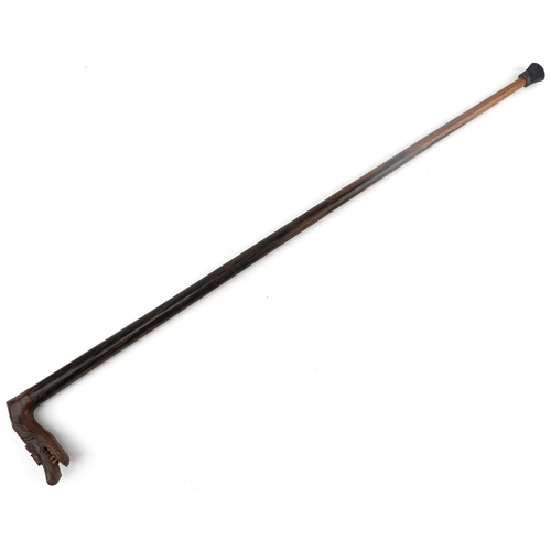 1424 - Rosewood walking stick with carved Chinese dragon head handle, 90cm in length