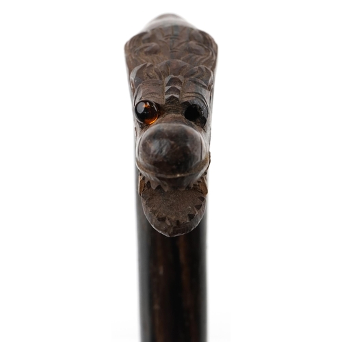 1424 - Rosewood walking stick with carved Chinese dragon head handle, 90cm in length