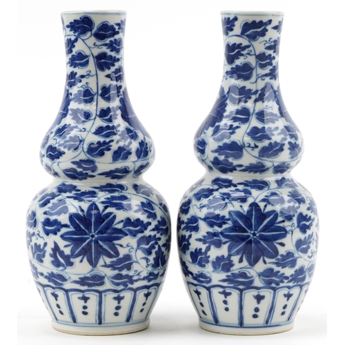  Pair of Chinese blue and white porcelain double gourd vases hand painted with foliage, 24cm high