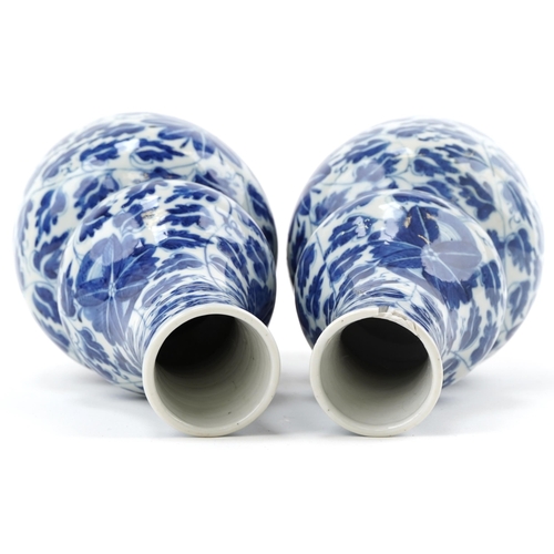  Pair of Chinese blue and white porcelain double gourd vases hand painted with foliage, 24cm high