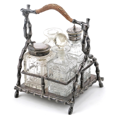 73 - Victorian aesthetic silver plated four bottle cruet stand with cut glass bottles, 19cm high