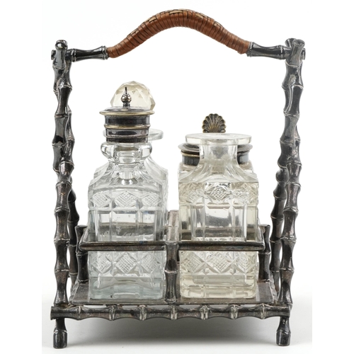 73 - Victorian aesthetic silver plated four bottle cruet stand with cut glass bottles, 19cm high