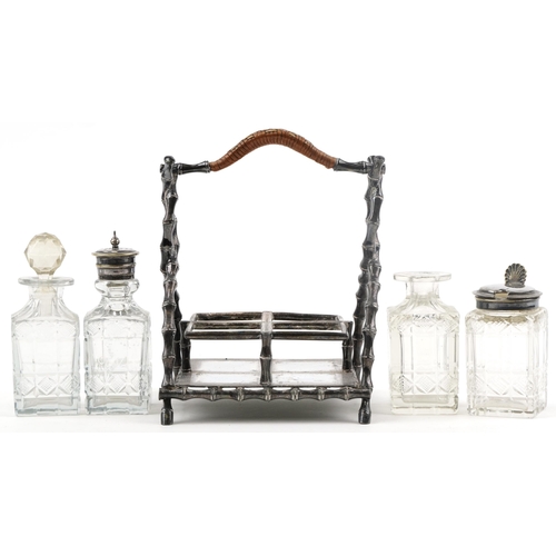 73 - Victorian aesthetic silver plated four bottle cruet stand with cut glass bottles, 19cm high