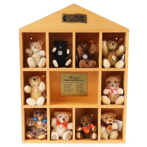 2044 - Ten Decades of Famous Steiff Teddy Bears with display stand and box, 60cm high