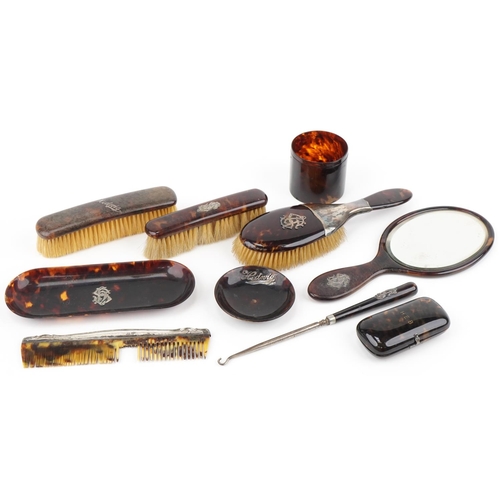 129 - Collection of tortoiseshell and faux tortoiseshell vanity items, some with silver mounts, including ... 