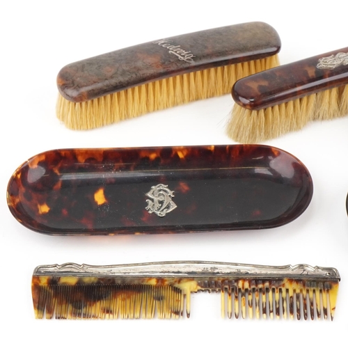 129 - Collection of tortoiseshell and faux tortoiseshell vanity items, some with silver mounts, including ... 