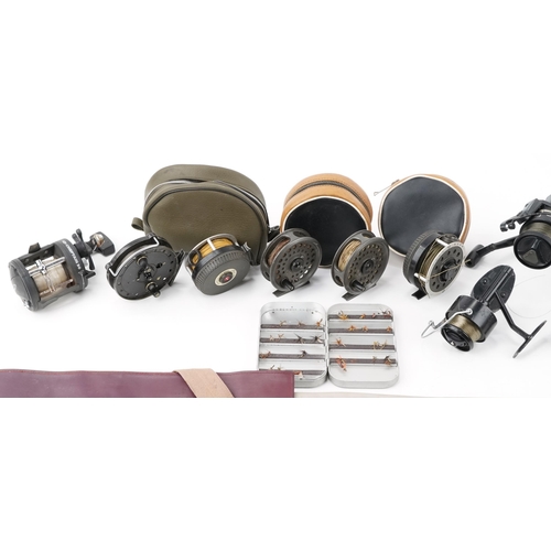 2399 - Collection of vintage and later fishing reels and a split cane fishing rod including Mitchell and fl... 