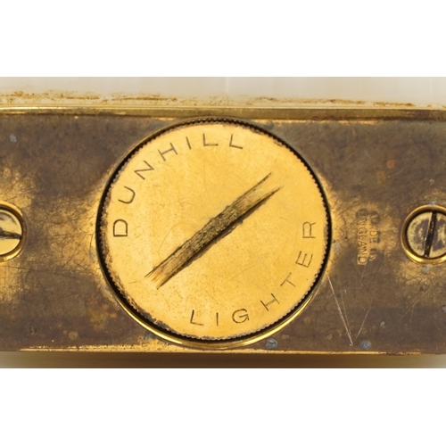 71 - Dunhill onyx and brass table lighter, 10cm wide