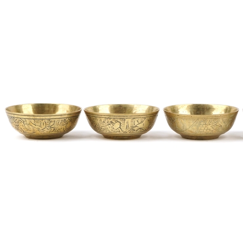 1238 - Set of six Egyptian bronze bowls engraved with camels and pyramids, 10cm in diameter