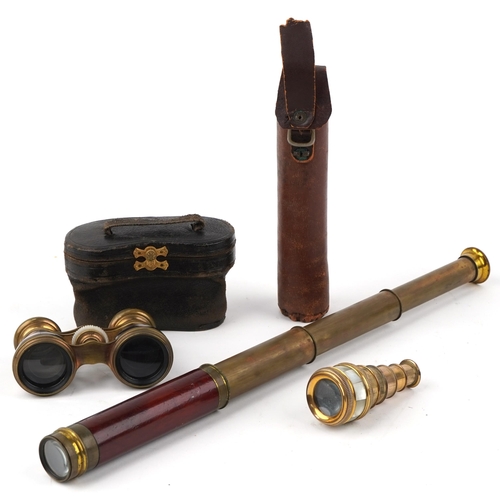 130 - Optical instruments comprising a brass three draw telescope, pair of R Treuer opera glasses and a mo... 