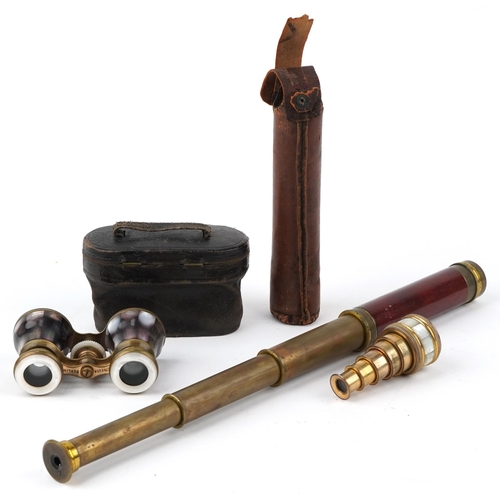 130 - Optical instruments comprising a brass three draw telescope, pair of R Treuer opera glasses and a mo... 