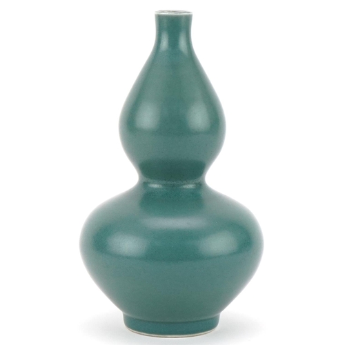 98 - Chinese porcelain celadon glazed double gourd vase, six figure character mark to the base, 16cm high