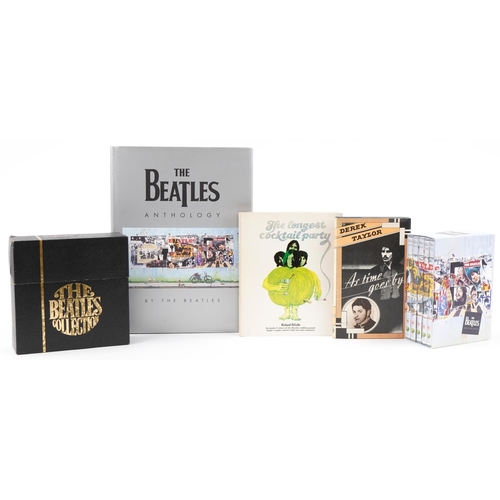 637 - The Beatles memorabilia including The Beatles Singles record Collection 1962-1970 and hardback books