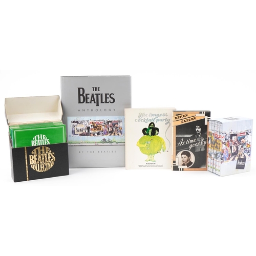 637 - The Beatles memorabilia including The Beatles Singles record Collection 1962-1970 and hardback books